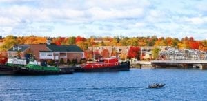 Fall in Sturgeon Bay. Overlooks bright fall leaves and the water with a boat