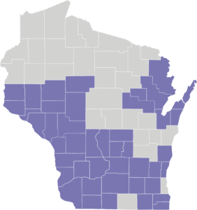 A gray map of Wisconsin with 8 purple counties colored in to show Family Care program coverage