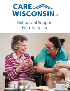 "Behavioral Support Plan Template" + A photo of a care giver talking with an elderly woman